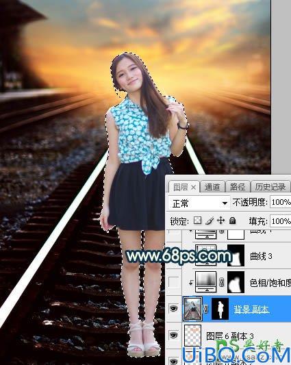 PhotoShop给铁轨中间自拍的长发美女模特图片调出唯美的黄色效果