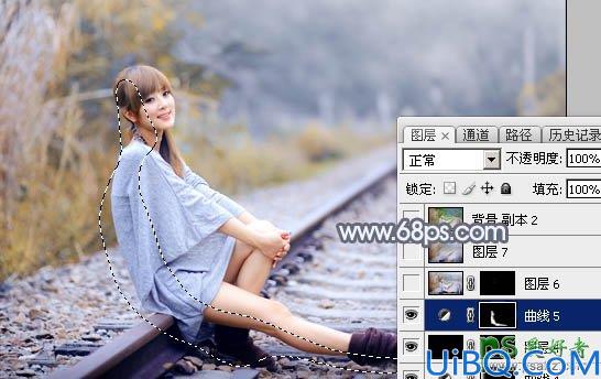 Photoshop调色教程：学习给外景铁路上自拍的美女艺术照调出秋季淡冷色