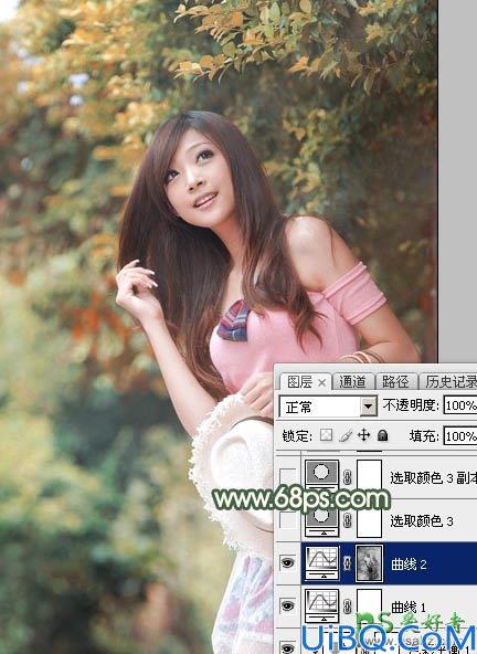 PhotoShop给绿色树林中自拍的女生照片调出唯美的秋季红褐色