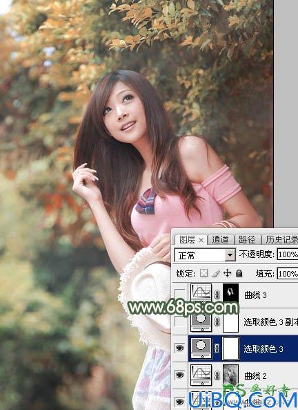 PhotoShop给绿色树林中自拍的女生照片调出唯美的秋季红褐色