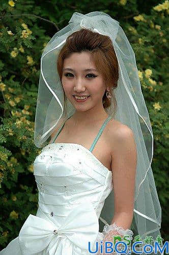 Photoshop抠图教程：学习用背景橡皮擦工具快速抠出美女婚纱照。