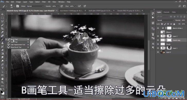 PS创意合成咖啡杯中的云雾雪山梦幻场景。