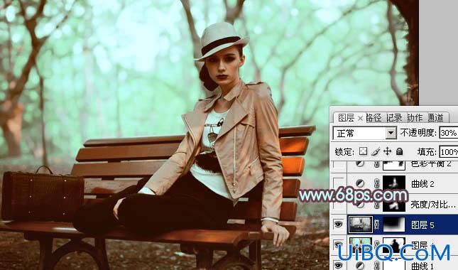ps给树林人物图片加上强对比的青褐色