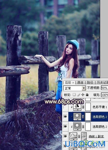 PS给景区木桩边自拍的唯美少女艺术照调出高对比蓝黄色