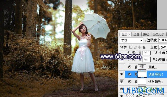 PS给森林中打伞拍照的女性婚纱照调出黄蓝色逆光效果