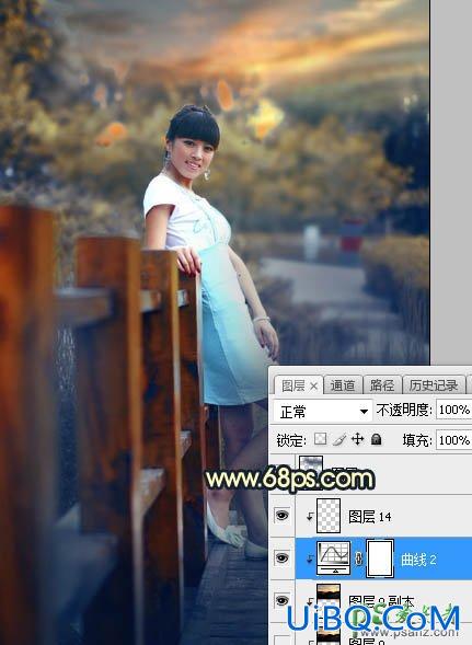 PS给景区木桥上拍摄的中年女人写真图片调出唯美的曦色