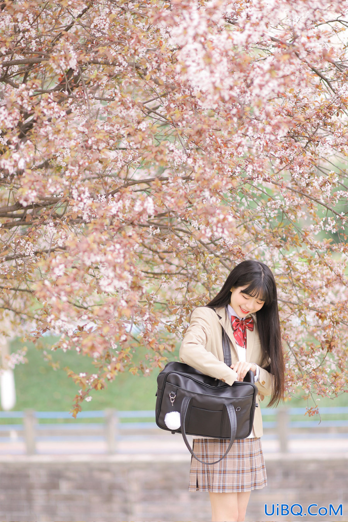 PS给樱花树下拍摄的少女写真照调出日系小清新效果。