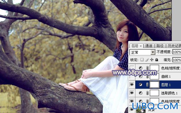ps坐树上的白裙美女