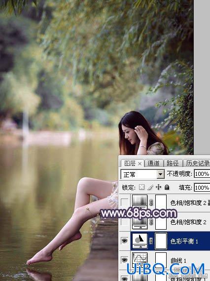 ps调出在河边洗脚的长发美女图片